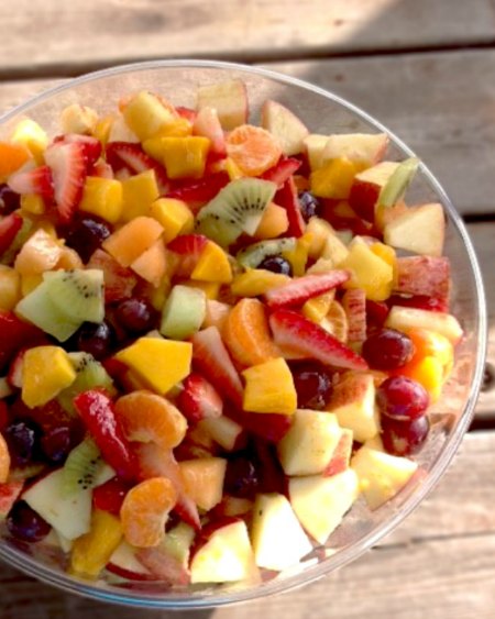 123 Fruit Salad in a glass bowl outside with dappled sunlight