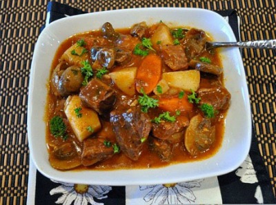 Balsamic Beef Stew in a square white bowl