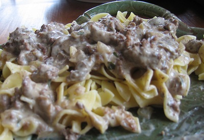 close up image of Low Fat Beef Stroganoff in a green serving dish