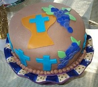 baking and decorating Communion cake on colorful plate