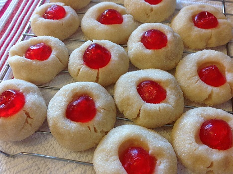 Cherry Gem Cookies lined up and cooling on a rack