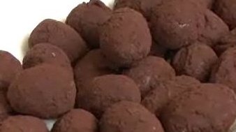 pile of chocolate covered grape truffles from the grape recipe collection