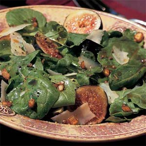 grilled fig and arugula salad from the grape recipe collection served in a large decorative bowl