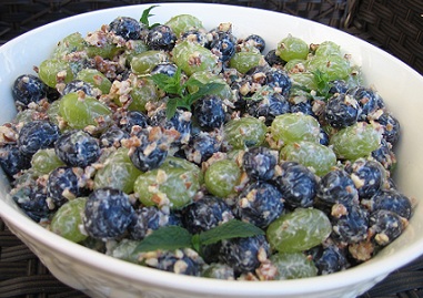 Grape Ambrosia Salad from the grape recipe collection in a white bowl