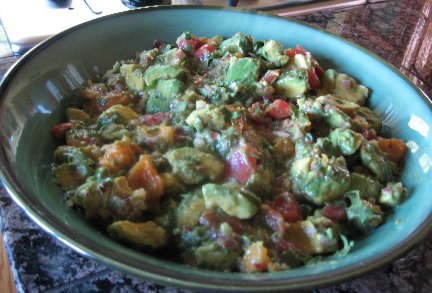 Chunky Guacamole Dip in a large turquoise bowl