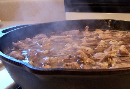 cooking pork cubes in cast iron skillet