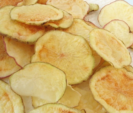 close up image of thin microwaved potato chips