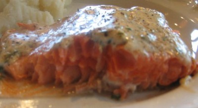 close up image of Barbecued Salmon on a white plate