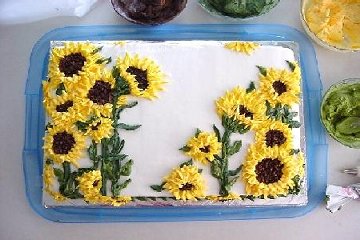 sheet cake decorated with sunflower icing