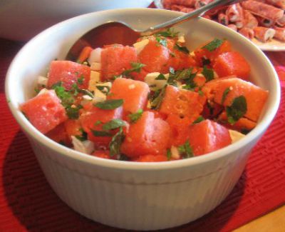 Watermelon Mint Salad in a white ramekin with a spoon