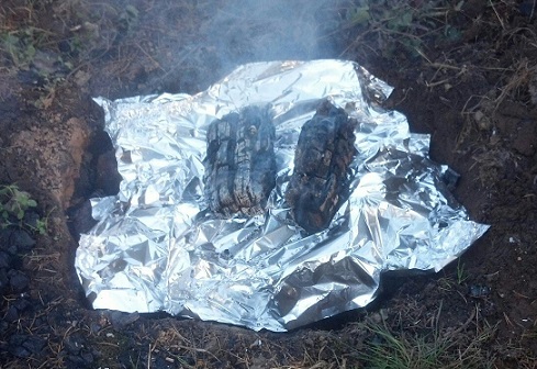 Pit covered with aluminum foil