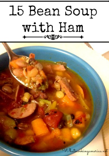 Bowl of 15 Bean Soup with ham and sausage in a bowl with a spoon