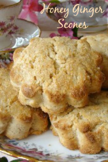 Honey Ginger Scones with scalloped edges on a floral plate