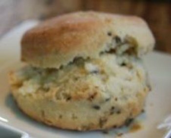 close up image of a lavender scone cut in half