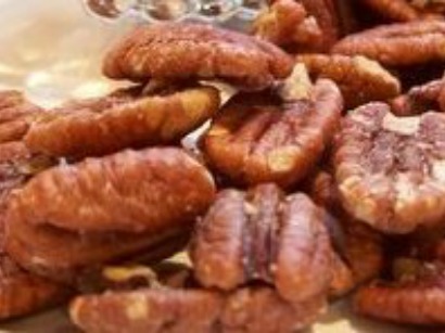 close up image of a bunch of bourbon pecans