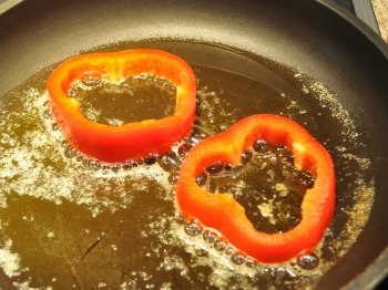 bell pepper slices saute in pan
