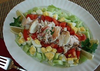 Gourmet Crab Louie Salad served on long white plate