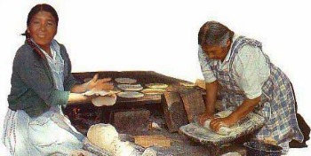 Native American's making tortillas