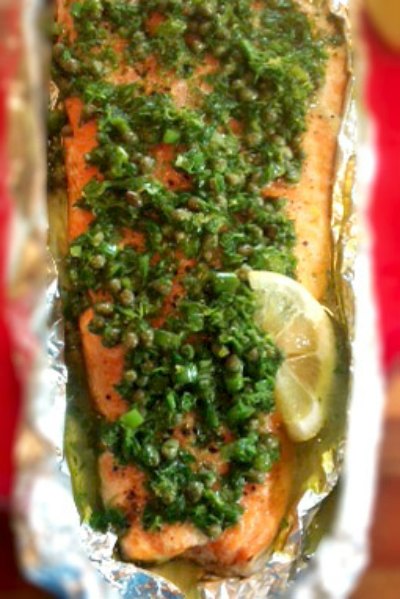 Fresh Herb Roasted Salmon Recipe in foil and garnished with lemon slice