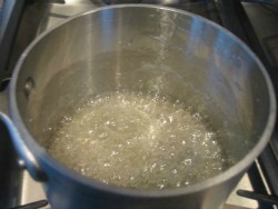 water and sugar boiling in pot stage 2