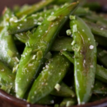 close up image of Roasted Sugar Snap Peas with salt from the pea recipe collection