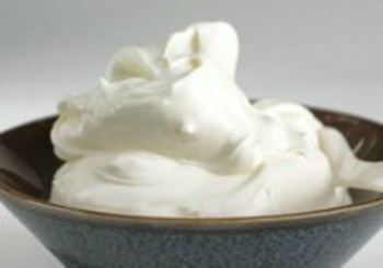 Creme Fraiche piled into blue bowl