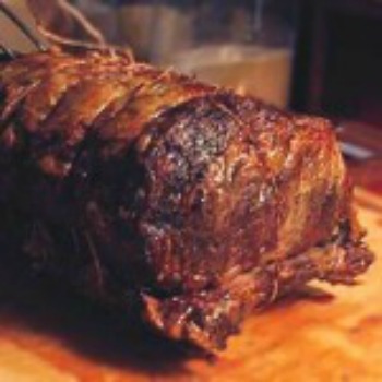 juicy prime rib roast on cutting block