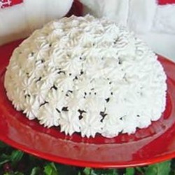 dome shaped cake decorated with white frosting
