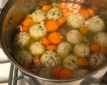 Matzo Ball Soup-matzo balls expanding